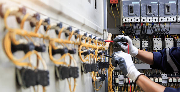 Professional Electrician technician working in Skyline, AL